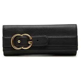 Borsa a pochette Gucci con fibbia GG