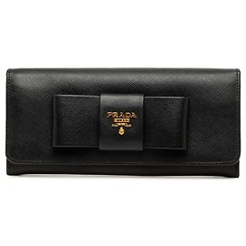 Cartera larga Prada Ribbon en piel Saffiano negra