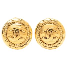 Boucles d'oreilles clips rondes Chanel CC plaquées or