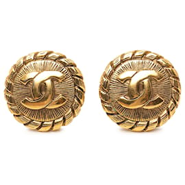 Orecchini a clip rotondi Sunburst Chanel CC placcati oro