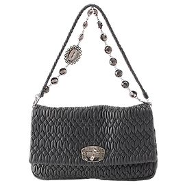 Borsa Satchel Miu Miu in Nappa Matelassé nera con catena di cristalli