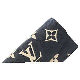 Louis Vuitton Monogram Empreinte Bi-fold Geldbörse