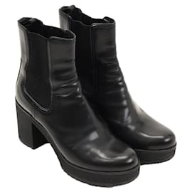 Botas Chelsea de plataforma em couro preto Prada