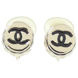 Pendientes de clip Chanel negros y dorados