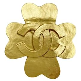 Spilla trifoglio Chanel in metallo dorato