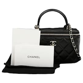 Chanel Borsa Vanity in pelle d'agnello con manico superiore e tracolla a catena Nero Oro