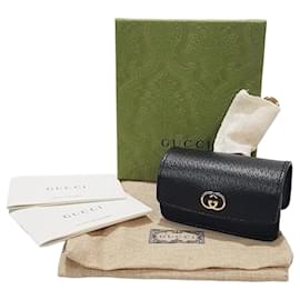 Gucci Porta-borsello da vita per cani in pelle nera placcata oro