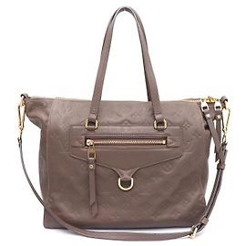 Louis Vuitton Borsa a mano e a tracolla Monogram Empreinte Lumineuses PM