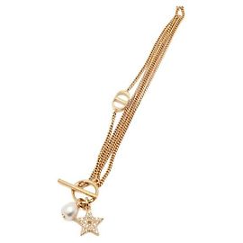 Dior Pulseira feminina em metal com acabamento dourado Crystal Star