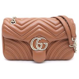 Gucci Borsa a tracolla matelassé media GG Marmont con catena dorata