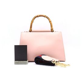 Gucci Piccola borsa tote e borsa a tracolla in pelle bicolore con manico in bambù