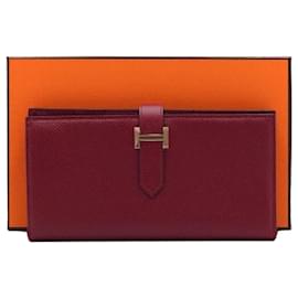 Portafoglio lungo con dettagli dorati per uomo e donna - Hermès