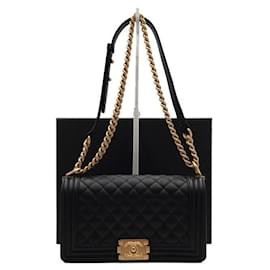 Chanel Borsa a tracolla con patta Medium con catena dorata