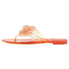 Chanel Sapatos Jelly femininos com logo CC e Camélia vermelha