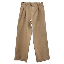 Gucci Pantalones rectos de lana con logotipo para mujer