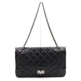 Chanel Borsa a tracolla vintage con patta e catena argentata