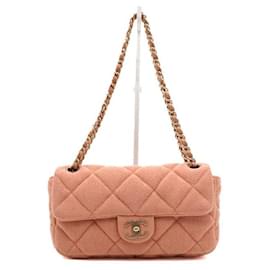 Chanel Mini borsa a tracolla con patta e catena in tela jersey rosa