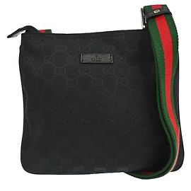 Borsa a tracolla Gucci Web Strap Zip in canvas GG e pelle Small