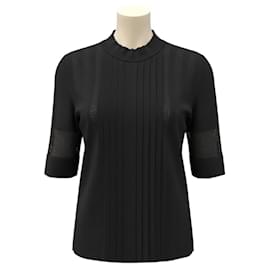 Emilio Pucci plissierter Strickpullover in Schwarz mit Dreiviertelärmeln und Mesh-Details an den Ärmeln