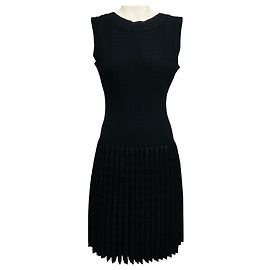 Alaïa Vestido acampanado Alaia sin mangas de punto brillante plisado negro