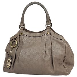 Borsa a mano Gucci Sukey in pelle grigia GG