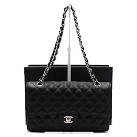 Chanel Borsa a tracolla media in pelle caviar nera classica con catena argentata