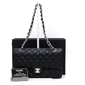 Chanel Borsa a tracolla Classic Medium in caviale nero con catena argentata