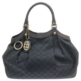 Bolsa Gucci em lona GG preta