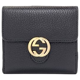 Portafoglio bi-fold Gucci in pelle nera