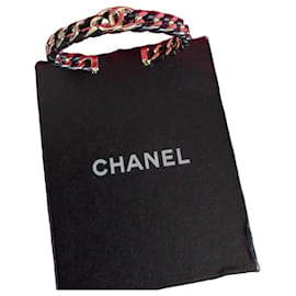 Bracciale rigido Chanel in pelle e metallo dorato