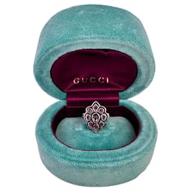 Anello fiore Gucci in metallo argentato con cristalli rossi