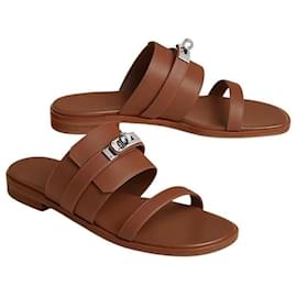 Hermès Kelly Damen Sandalen Pantoletten Gold