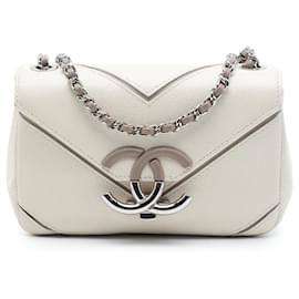 Borsa a tracolla Chanel Small Macro Chevron Caviar bianca