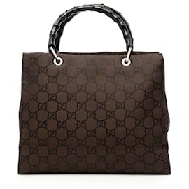 Borsa Gucci GG in nylon marrone con manico in bambù