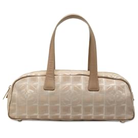Bolsa Chanel New Travel Line em nylon bege