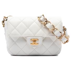 Borsa a tracolla Chanel Mini CC Quilted Caviar Messenger Flap Bianca