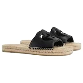 Gucci Sandali slide con ritagli intrecciati