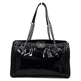 Chanel Borsa a tracolla Reverso Boy in vernice nera con catena