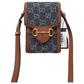 Gucci Borsa crossbody mini GG Denim con morsetto GG