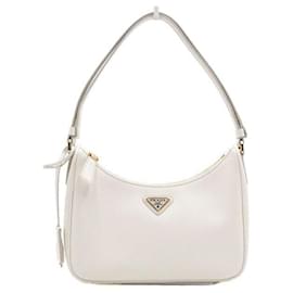 Mini bolso tote y bolso de hombro de piel Saffiano con logotipo triangular dorado - Prada
