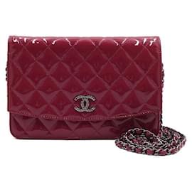 Chanel Borsa a tracolla WOC Wallet on Chain in vernice rosa con catena logo tono argento