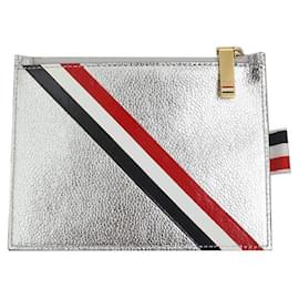 Portacarte con zip argentato Thom Browne