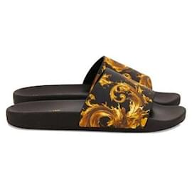 Ciabatte Versace stampate nere e oro