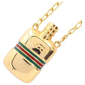 Collana lunga Gucci con flacone di profumo