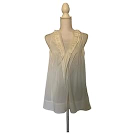 Marc Cain Blusa blanca sin mangas con volantes