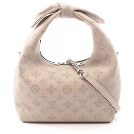 Sac à main Louis Vuitton en cuir beige