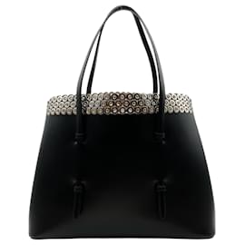 Tote in pelle nera con occhielli Alaïa