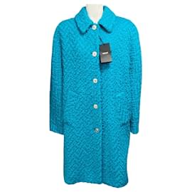 Cappotto Versace in lana bouclé Astrakan turchese con bottoni Medusa