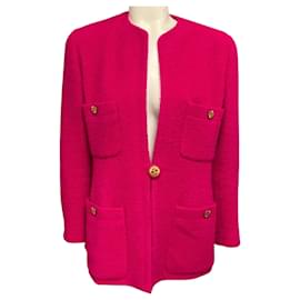 Chaqueta Chanel Vintage de tweed de lana bouclé rosa fucsia con botones logo CC dorados
