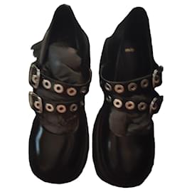 Maje Zapatos Mary Jane negros de doble hebilla y ojales